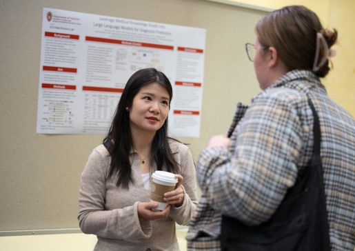 A researcher presents her poster at the 2024 WisconsINFORMATICS conference