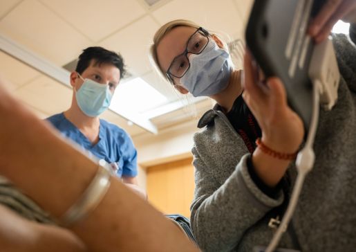 Physicians performing an ultrasound.
