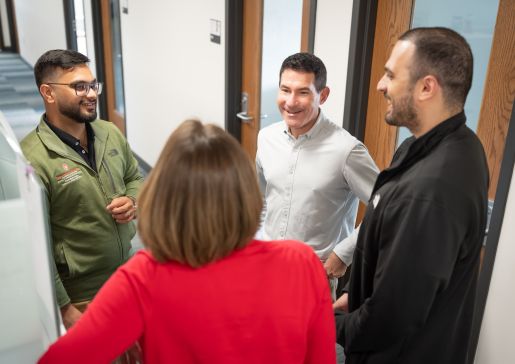 Dr. David Schneider talks with clinical informatics trainees.